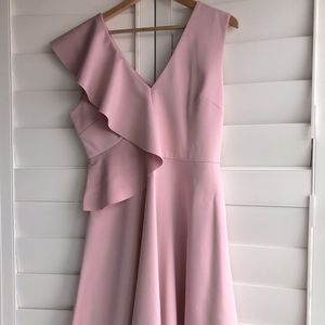 Medium pink Ted Baker dress with layer of frill on right side